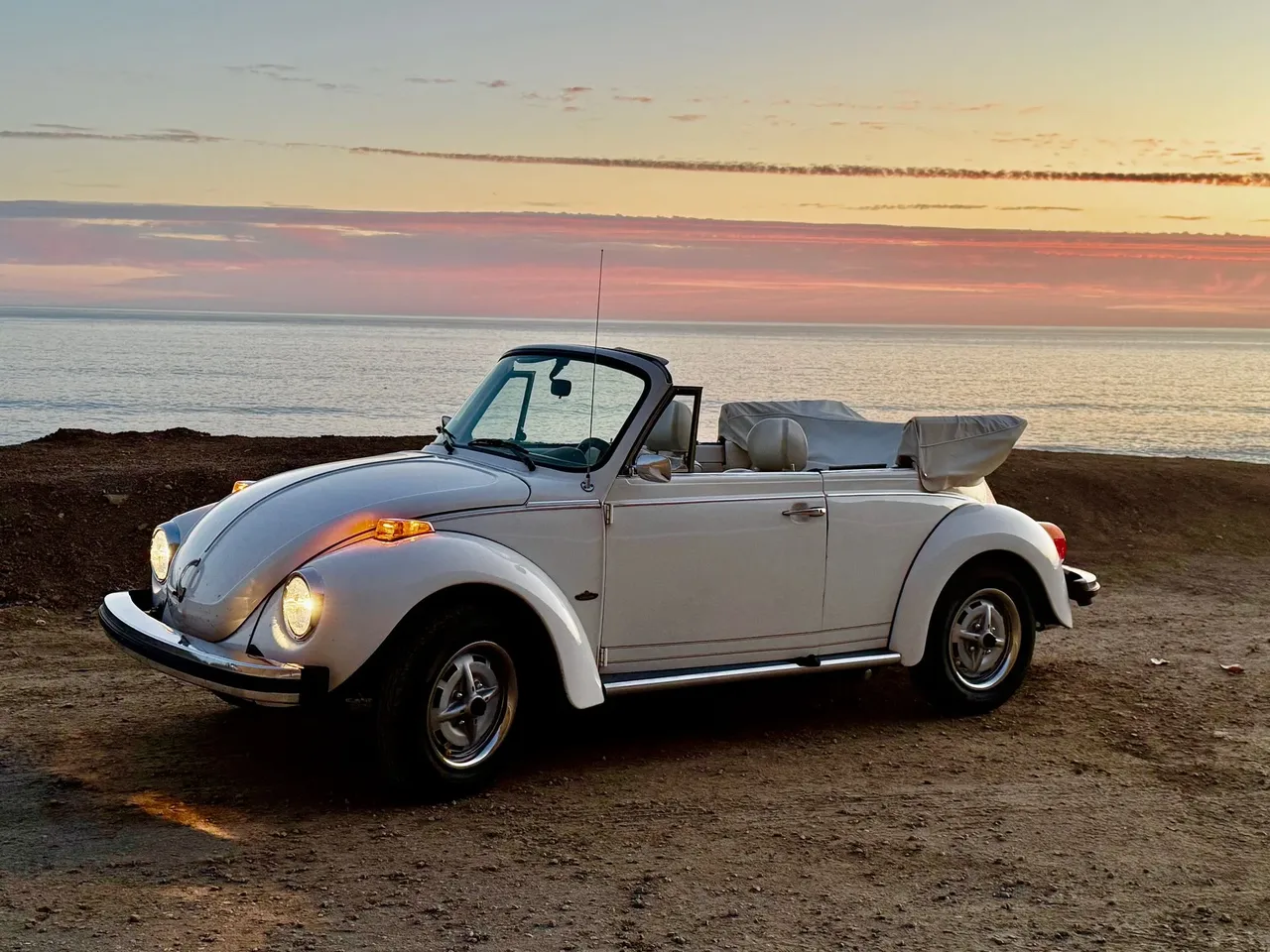 White 1977 Beetle Convertible wedding car rental White 1977 Beetle Convertible wedding car rental